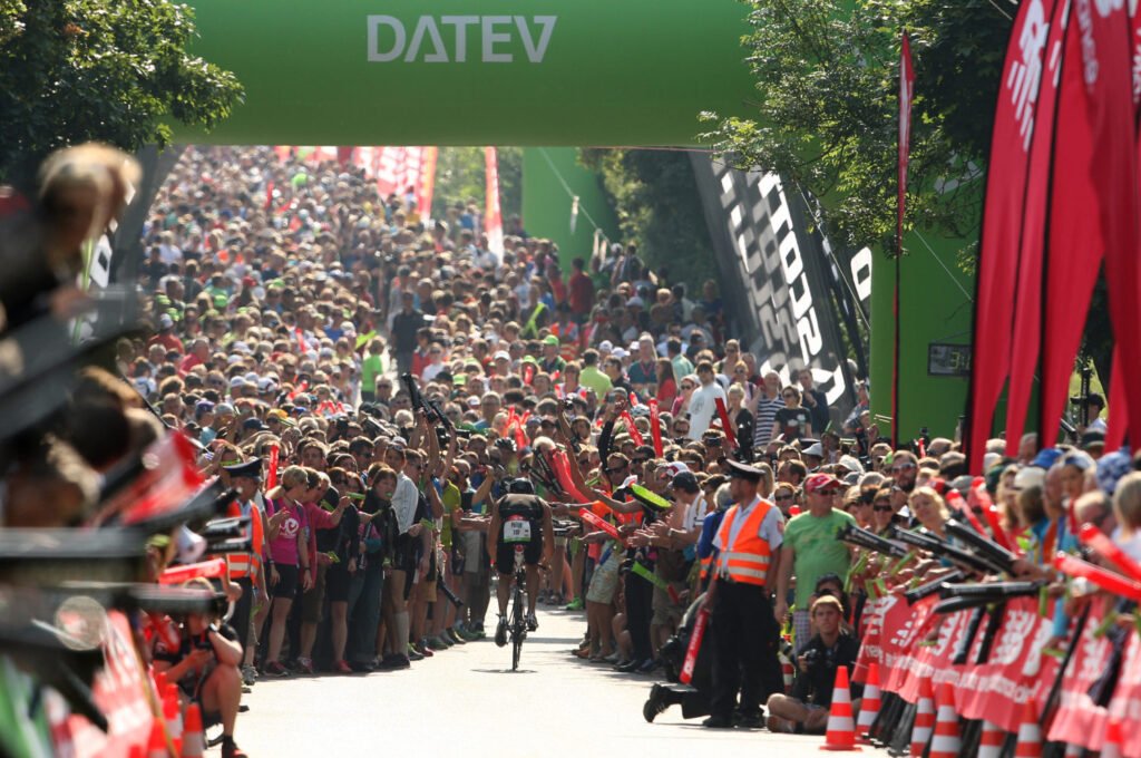 ROTH, GERMANY - JULY 14: Crowds congregate on Solar Hill on the bike stage during the Challenge Roth Triathlon on July 14, 2013 in Roth, Germany. (Photo by Stephen Pond/Getty Images)
